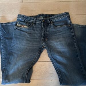 Diesel Blue Straight Leg Jeans with Faded Distress